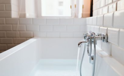 Bathtub with slow drain requiring professional attention