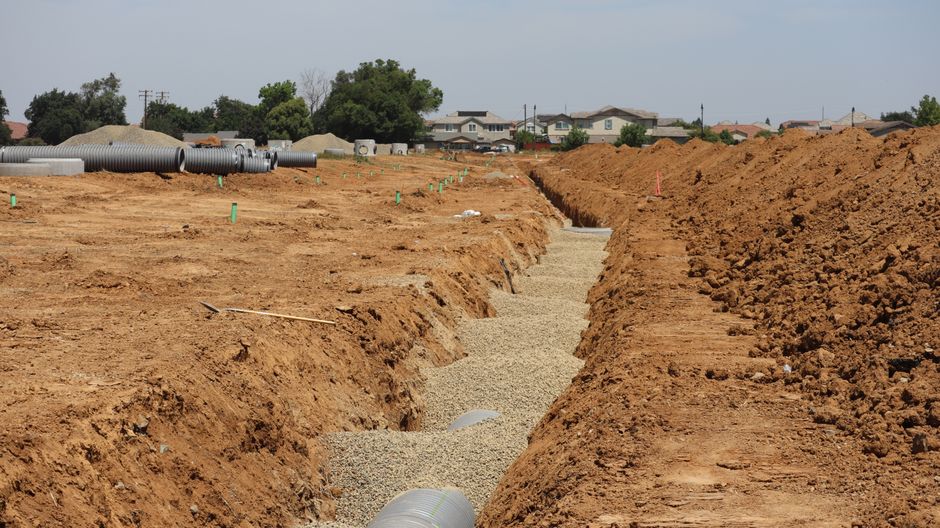 Professional landscape drainage system protecting property