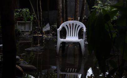 Flooded New Orleans backyard needing drainage solutions