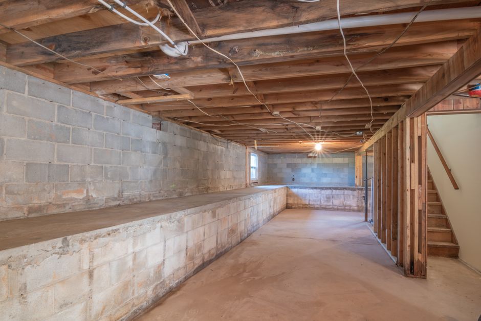 Sump pump protecting below-grade space from water intrusion
