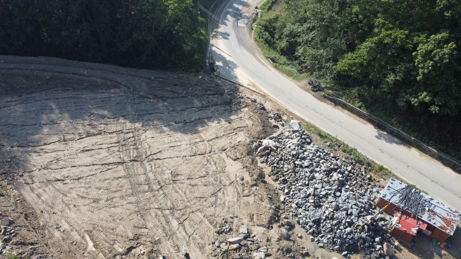 Professional yard grading to correct drainage slope