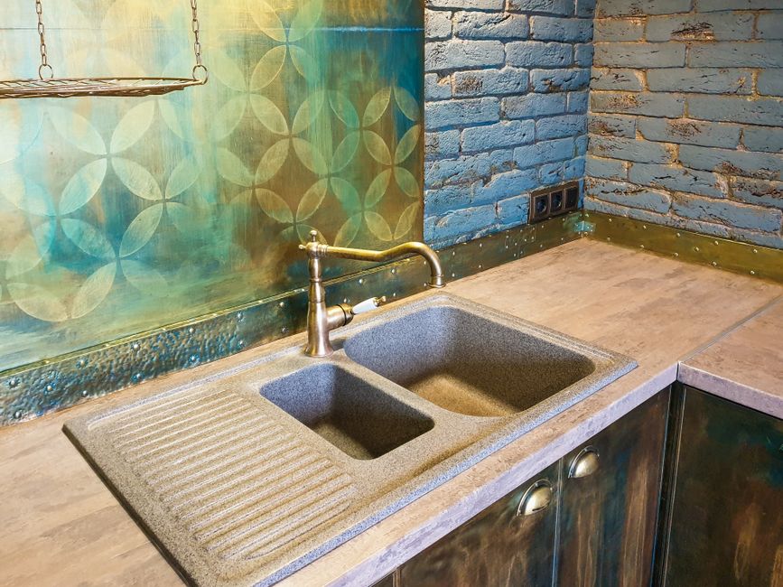 Kitchen sink with garbage disposal requiring proper care